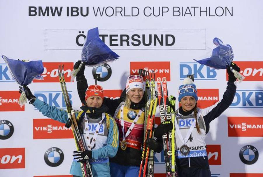 Il primo podio della stagione 2014-15: terzo posto a Ostersund, dietro l&#39;argento dell&#39;ucraina Semerenko e l&#39;oro della finlandese Makarainen. AFP